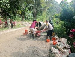 Bhabinkamtibmas Polres Tator Turut Sukseskan TMMD