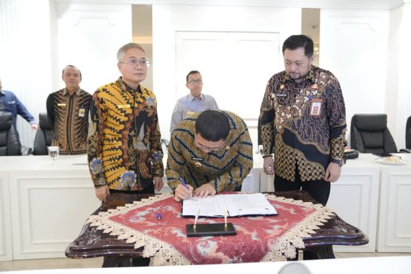 Makassar Teken PKS Tripartit Optimalisasi Pajak Pusat-Daerah